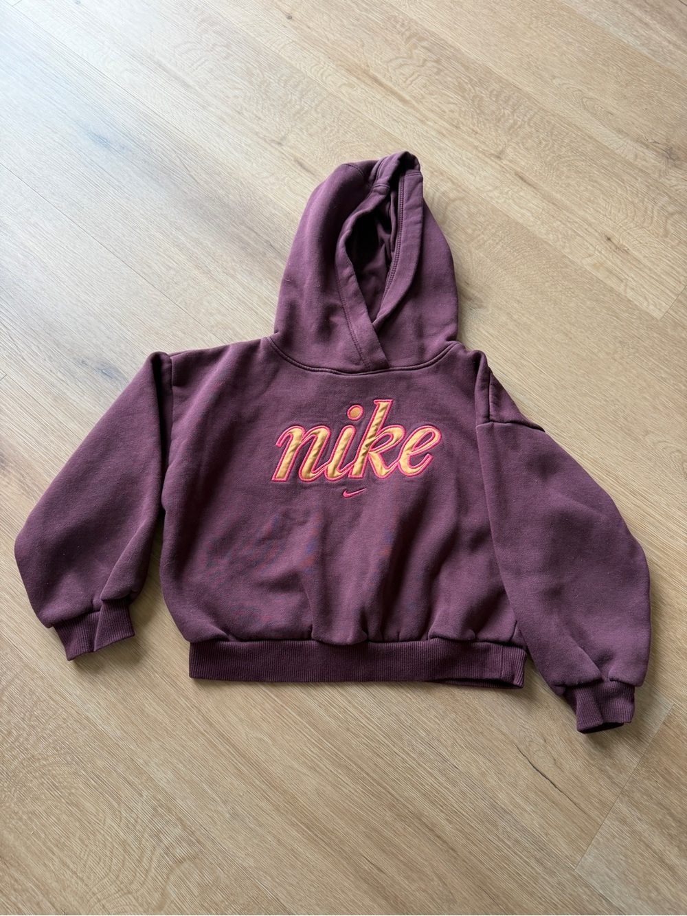 Nike Kids Hooded Sweatshirt in Burgundy with Orange-Pink Logo